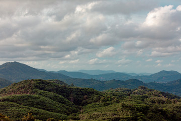 landscape with mountains and clouds