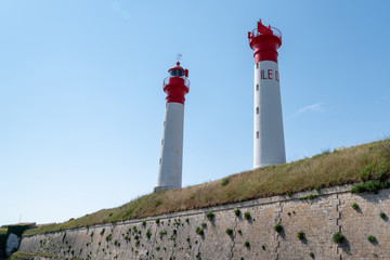 Lighthouse white and red in a French Island Aix in Charente France