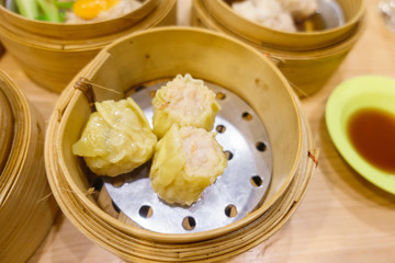 chinese crab steamed dumpling Dim Sum in Bamboo Steamer Basket.