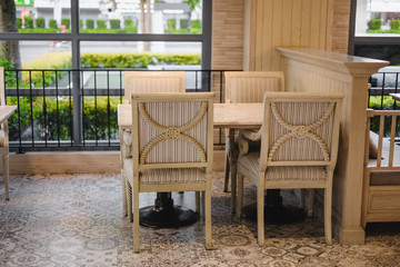 Vintage table and chairs decorated modern style interior room.
