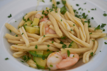 Strozzapreti pasta with zucchini and shrimps