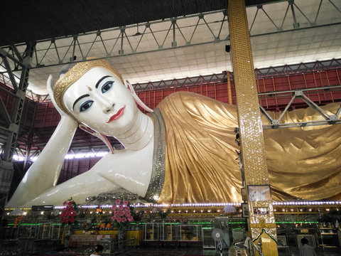 Buddha sleeping, buddha statue in myanmar temple, Shwethalyaung reclining buddha, Bago, Myanmar, Reclining Buddha Kyauk htat gyi at Temple in Yangon,Yangon, Myanmar (Burma)