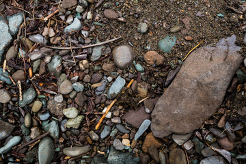 The texture of a shallow river stone. Pebble Background Image