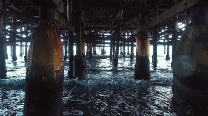 Walking under pier in 4K