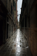 Narrow street of Venice in a mysterious night