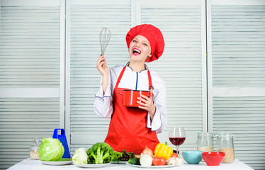 Use hand whisk. Woman chef hold whisk and pot. Girl in apron whipping eggs or cream. Start slowly...