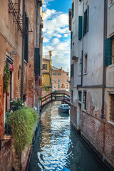 Fototapeta na wymiar old architecture and narrow canal in Venice