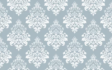 Kissenbezug Wallpaper in the style of Baroque. Seamless vector background. White and blue floral ornament. Graphic pattern for fabric, wallpaper, packaging. Ornate Damask flower ornament © ELENA