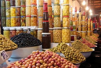 Olives and other pickled vegetables on a market in Marakech, Morocco.