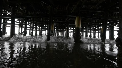 Walking under pier in 4K