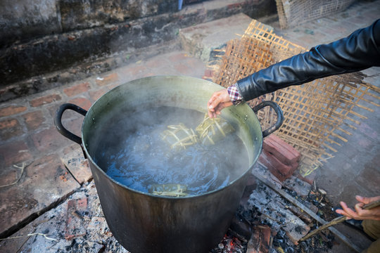 Big pot to cook Chung cake outdoor, square glutinous rice cake, Vietnamese lunar new year food