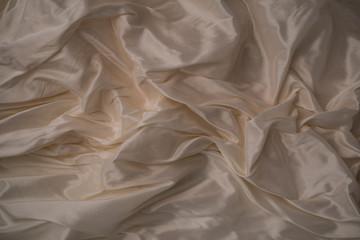 Obraz premium Obraz w tle pomarszczonej różowej tkaniny