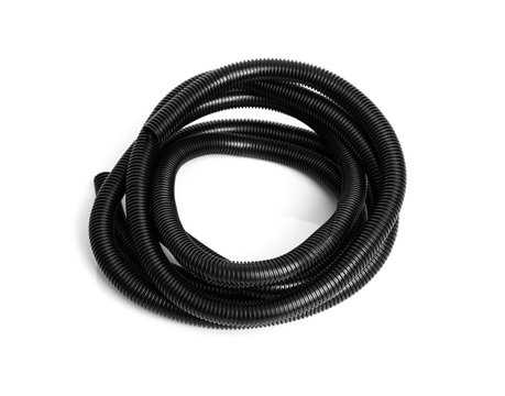 Corrugated black plastic hose for electrical wiring on a white background.