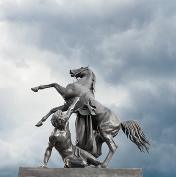"Horse Tamer". Sculpture of the 19th century on the Anichkov Bridge. The sculptor Klodt. St. Petersburg Attraction. Russia.