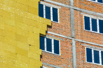 work on the external walls of glass wool insulation and plaster