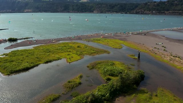 KITEBOARDING IS THE closest most of us humans will ever get to flying, and the Columbia River Gorge, a chasm lined with luscious evergreen forests, waterfalls, and cliffs on the Washington-Oregon bord
