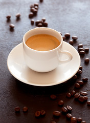 Hot cup of espresso coffee on a table