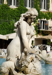 ROME, ITALY - JUNE 16, 2017: Nereid statue in the Piazza Navona Fountain of Neptune