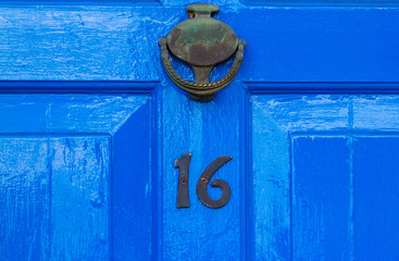 House number 16 with door knocker