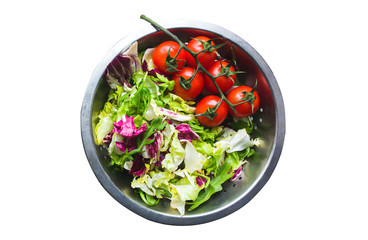 Fresh salad in plate isolated on white background. Vegan food.