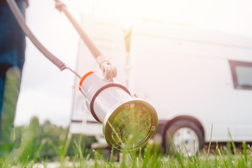 Fototapeta premium Measurement dosimeter radiation pollution soil grass environment