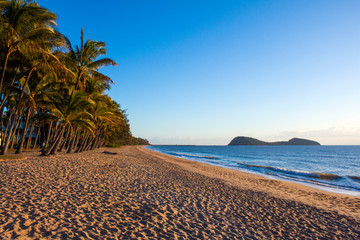 Beautiful Palm Cove beach near Cairns in Far North Queensland, Australia,  is a popular tropical tourist destination