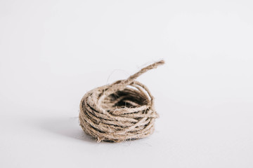 Kraft brown twine on the white background