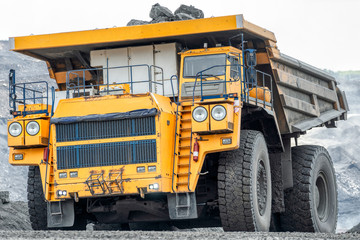 Large quarry dump truck. Transport industry.