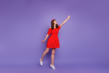 Full body photo of pretty lady going to fly air wear off-shoulders dress isolated purple background