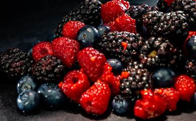 Mixed berries in the black. Calgary, Alberta, Canada