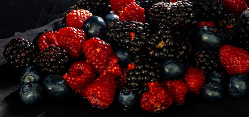 Mixed berries in the black. Calgary, Alberta, Canada