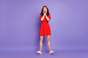 Full length body size photo of frightened scared girl seeing something horrible while isolated with violet background