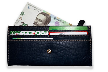 Leather wallet with a visible part of the Ukrainian banknote.