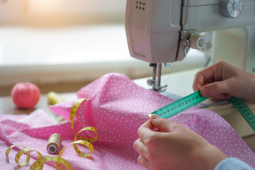 Sewing process. Sewing clothes using a sewing machine and accessories