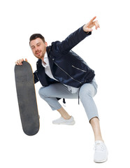 A man with a skateboard.