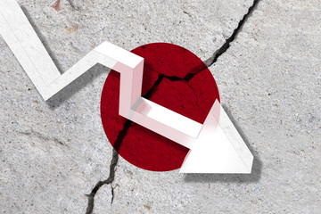 Japan Flag on the cracked wall with arrow falling down. Concept of decrease in the country.