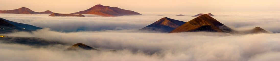 Lanzarote volcanic landscape shrouded in morning mists