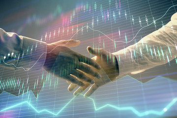 Multi exposure of forex graph on abstract background with two businessmen handshake. Concept of success on stock market