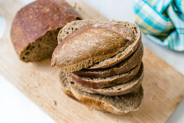 Ciabatta Sourdough Bread with Olive Oil on Wooden Board.