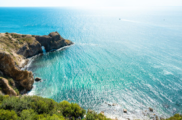 Summer sea landscape. Rocky coast of the Black sea in Crime Diana's grotto on Cape Fiolent,...