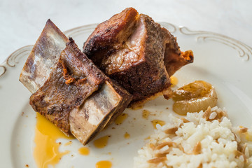 Veal Ribs Chop Meat with Rice Pilav / Pilaf served in Plate.