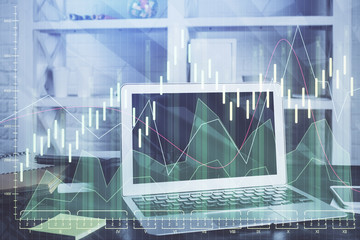 Double exposure of graph and financial info and work space with computer background. Concept of international online trading.