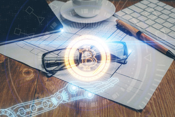 Crypto theme hologram with glasses on the table background. Concept of blockchain. Double exposure.