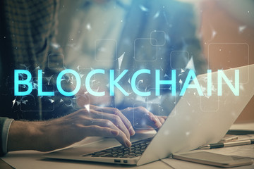 Blockchain theme hud with man working on computer on background. Concept of crypto chain. Double...