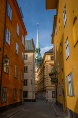 Narrow alleys in the old town Gamla Stan in Stockholm a summer day.