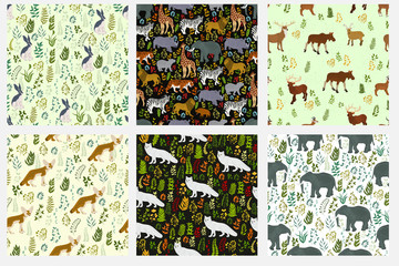 Set of seamless patterns with wild animals and plants.