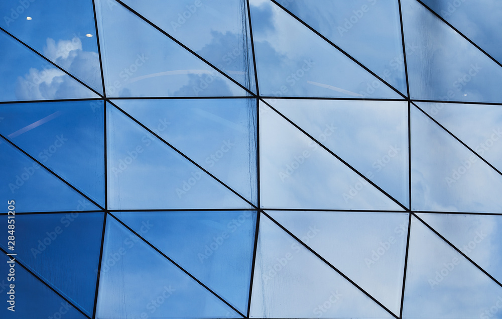 Poster abstract square and triangle pattern design glass facade wall or window with sky reflection