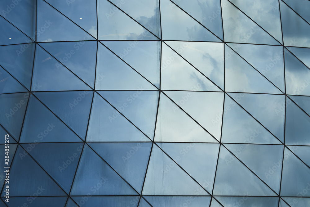 Aufkleber abstract square and triangle pattern design glass facade wall or window with sky reflection