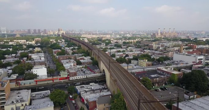 Drone parallax over Bronx train track bridge