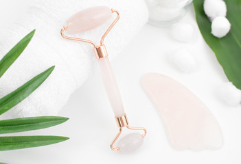Jade roller for face massage. Anti age, lifting and toning treatment